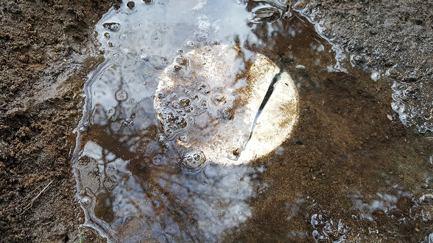 Cracked Inspection Port Lid